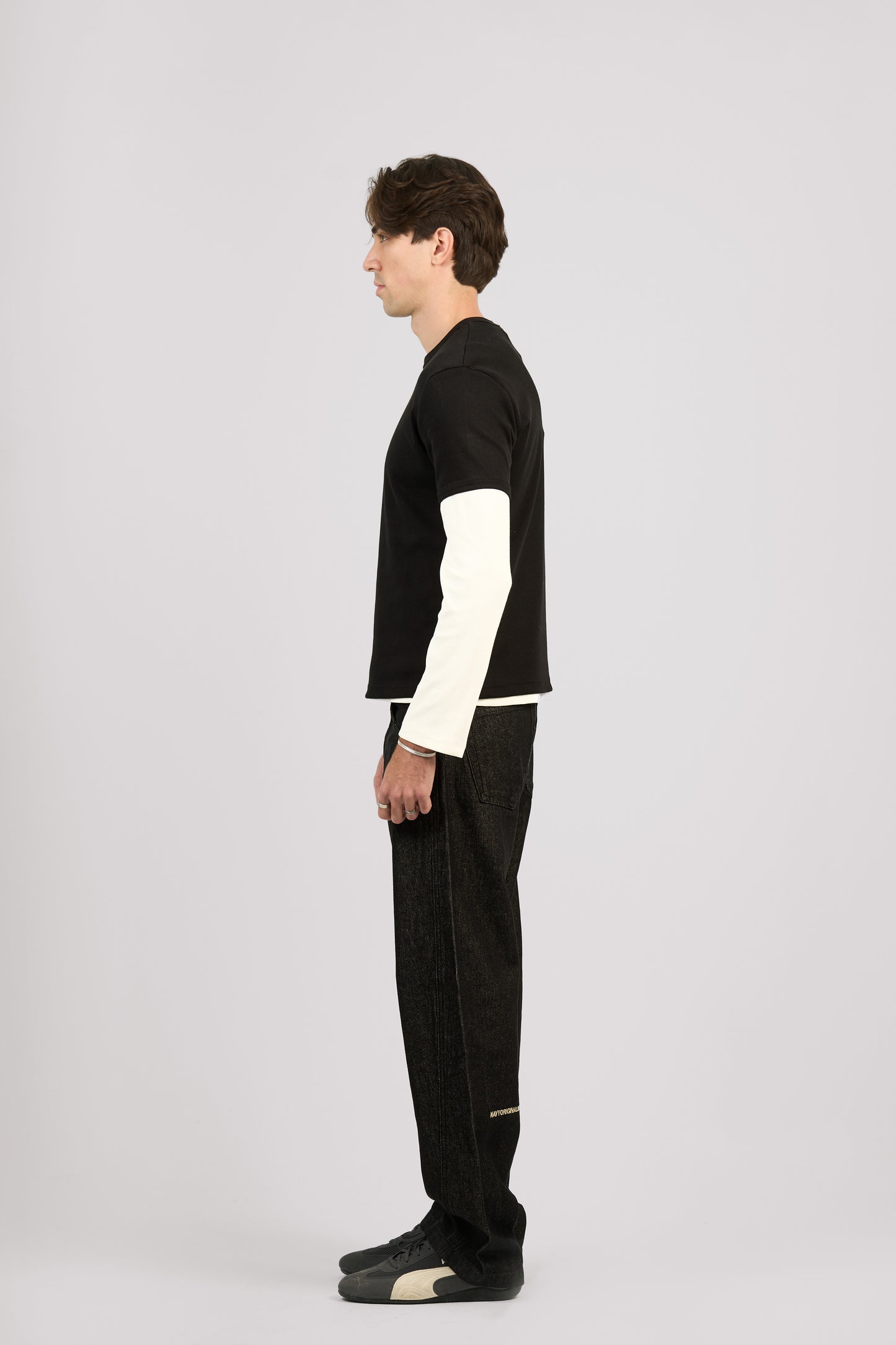 RAW BLACK X BLACK SLANTED JEANS