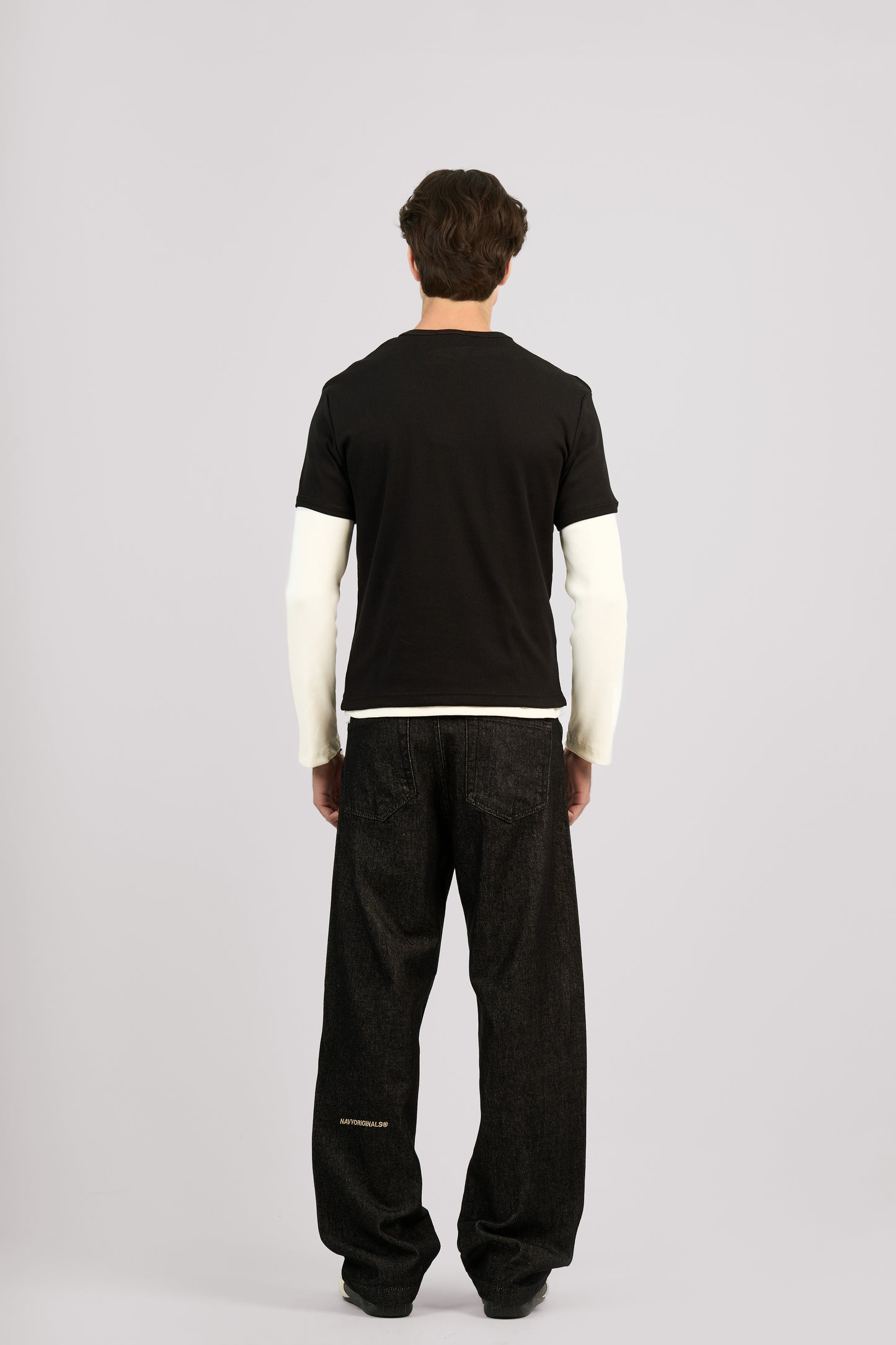 RAW BLACK X BLACK SLANTED JEANS