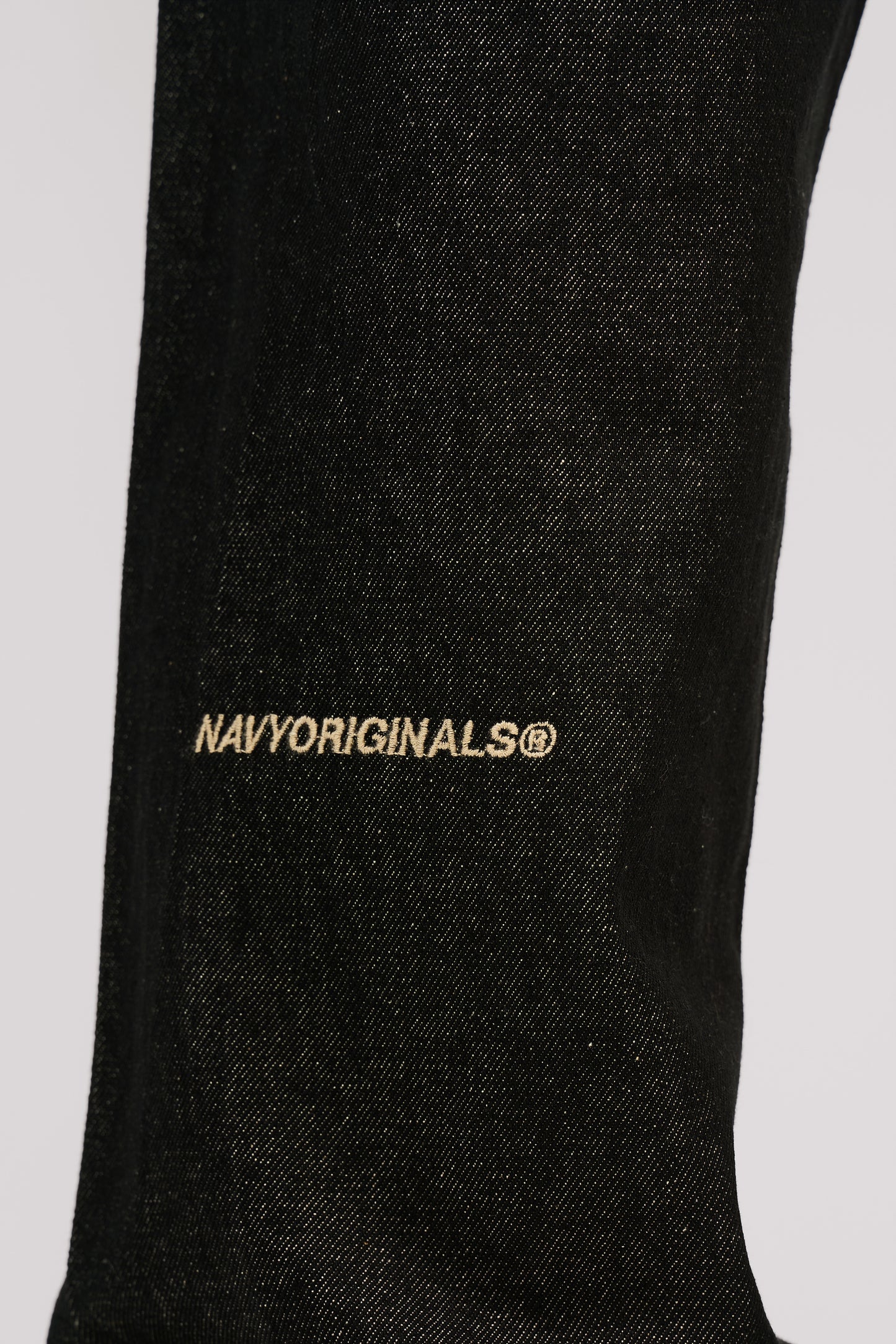 RAW BLACK X BLACK SLANTED JEANS