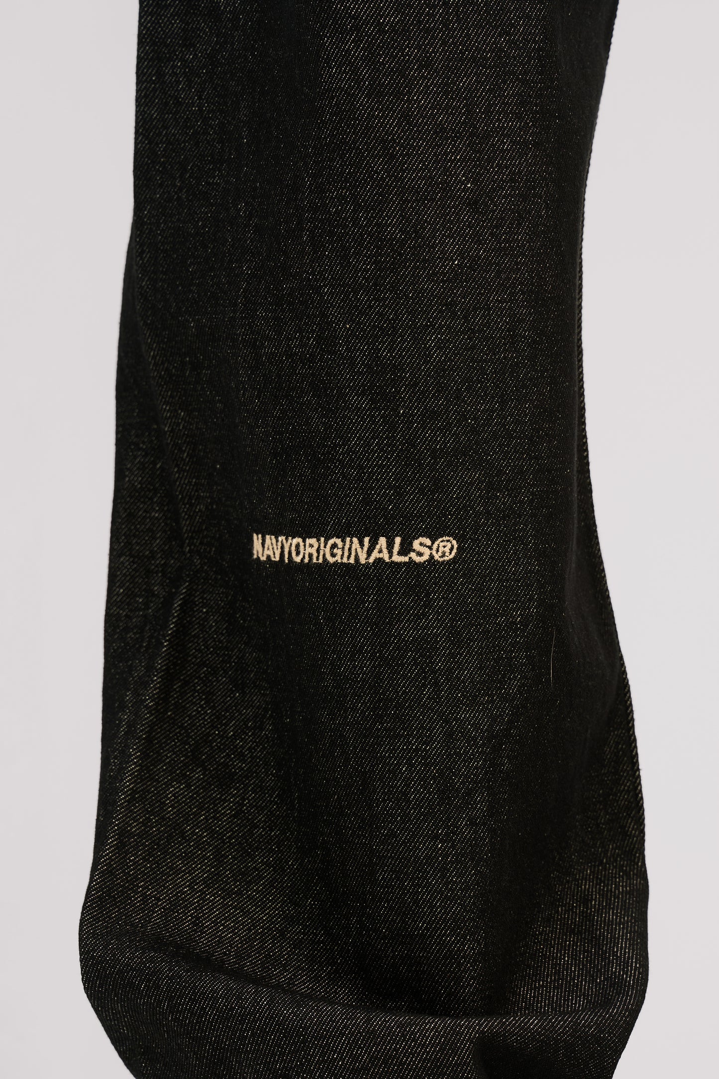 RAW BLACK X WHITE SLANTED JEANS